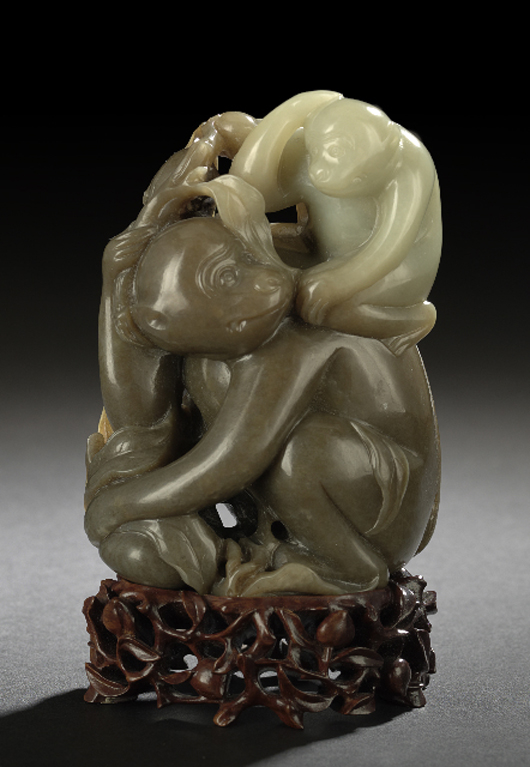 Natural color variation in the jade stone is used to advantage in this carving of a mother monkey with a child on her shoulder. The group brought $34,440 in a May sale at New Orleans Auction Galleries. Courtesy New Orleans Auction Galleries
